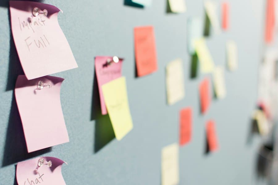 Sticky notes on a product planning board
